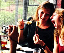 Students eating dumplings