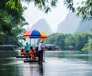 Bamboo raft in Yulong River Bamboo raft in Yulong River